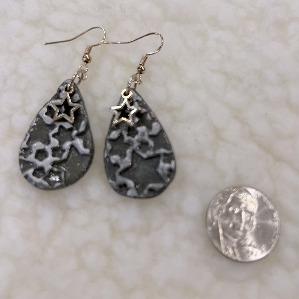 Hand made clay earrings.